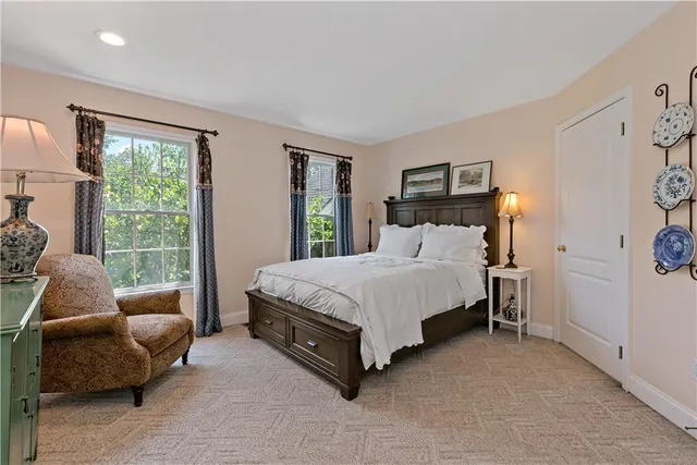 a bed room with a bed and a couch