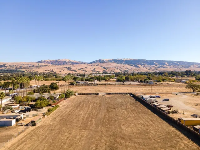 an aerial view of residential building and lake view