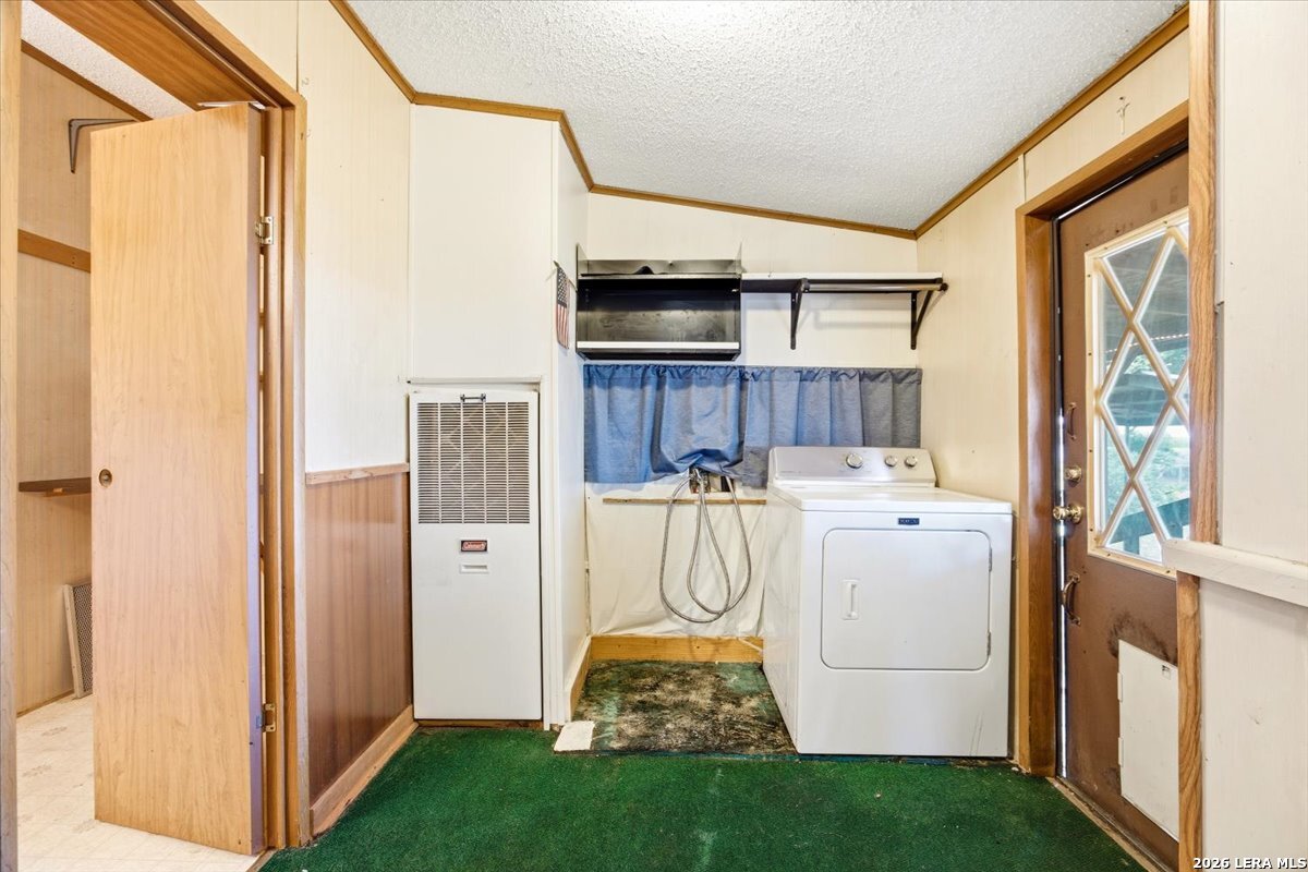 176 Golden Meadows Cibolo, TX 78108 - Photo 11 of 28 a utility room with dryer and washer