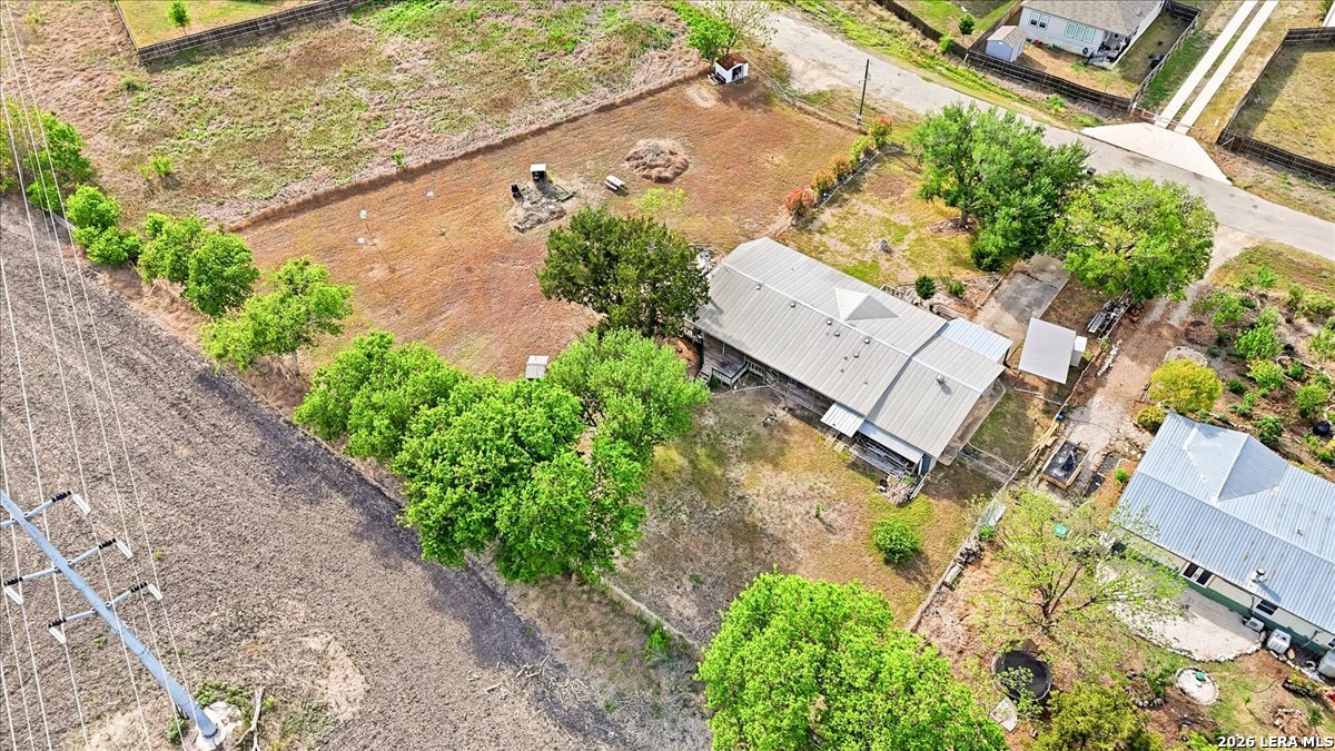 176 Golden Meadows Cibolo, TX 78108 - Photo 25 of 28 an aerial view of a house with garden space and a lake view