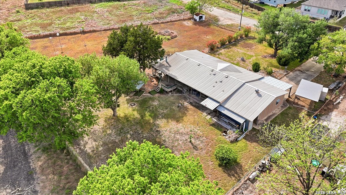176 Golden Meadows Cibolo, TX 78108 - Photo 27 of 28 an aerial view of a house with a yard and lake view