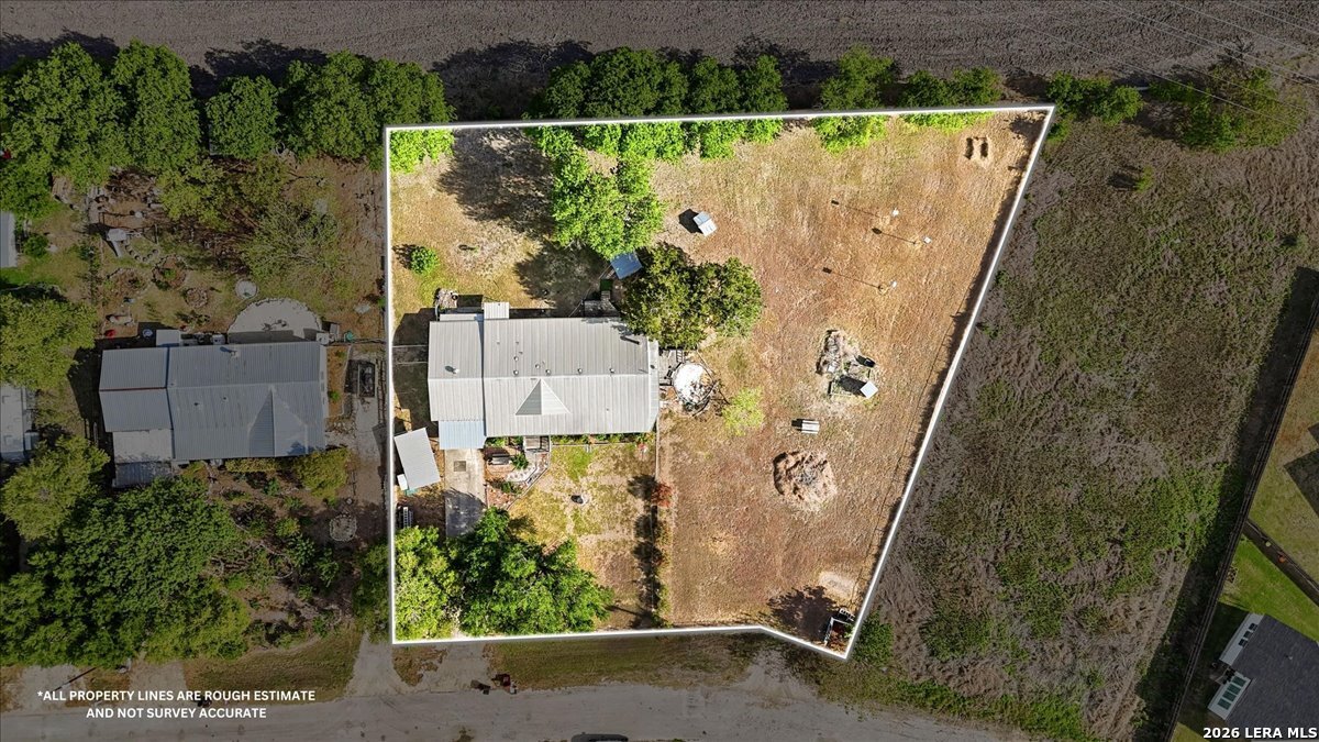 176 Golden Meadows Cibolo, TX 78108 - Photo 28 of 28 an aerial view of a house with a yard