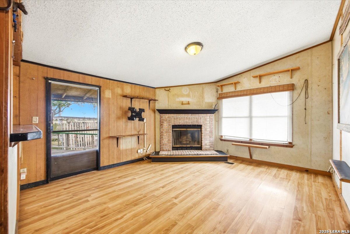 176 Golden Meadows Cibolo, TX 78108 - Photo 7 of 28 a view of a livingroom with a fireplace and window