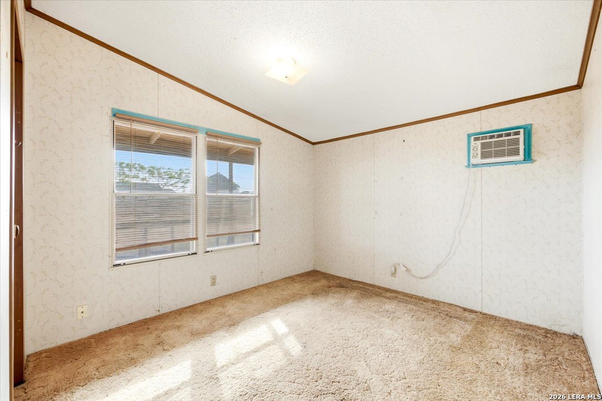 176 Golden Meadows Cibolo, TX 78108 - Photo 9 of 28 an empty room with a empty space and windows