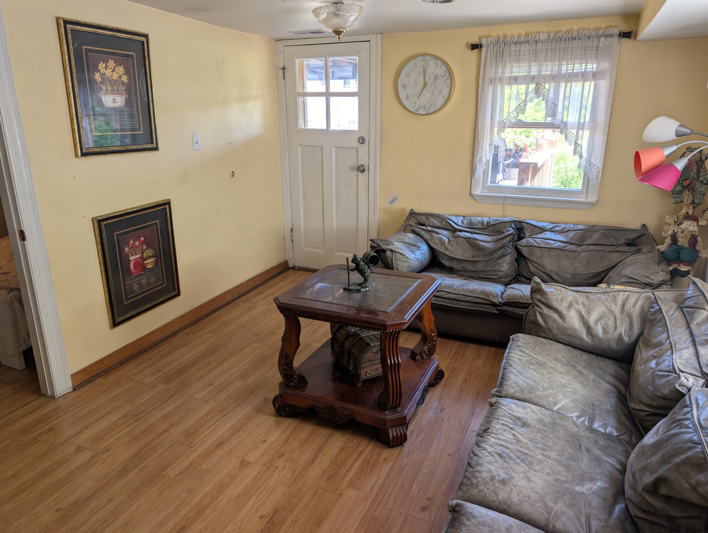 3233 South Morgan Street Chicago, IL 60608 - Photo 3 of 14 a living room with furniture and a window
