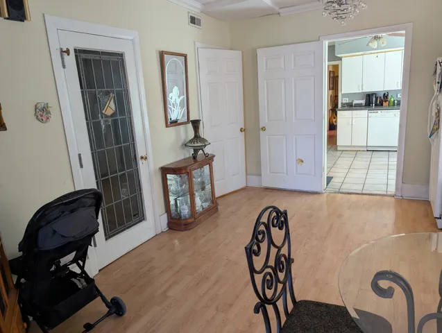 a view of livingroom with furniture and front door