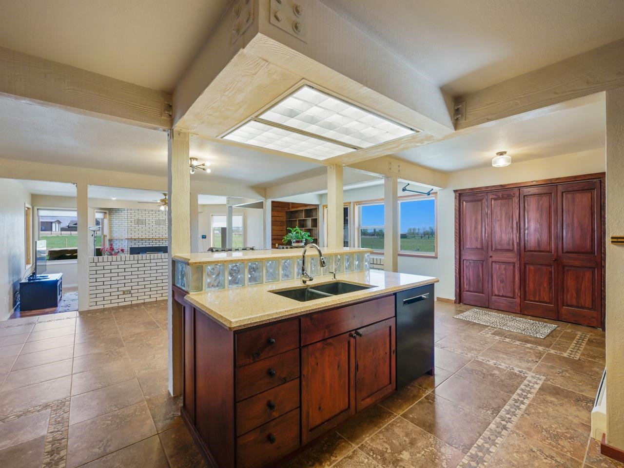 1140-23 23 1/2 Road Grand Junction, CO 81505 - Photo 13 of 42 a bathroom with a granite countertop sink and a large mirror