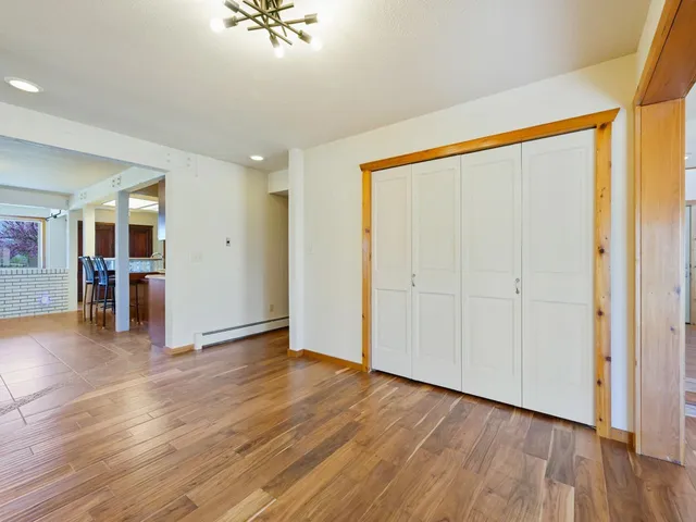 a view of a livingroom with wooden floor
