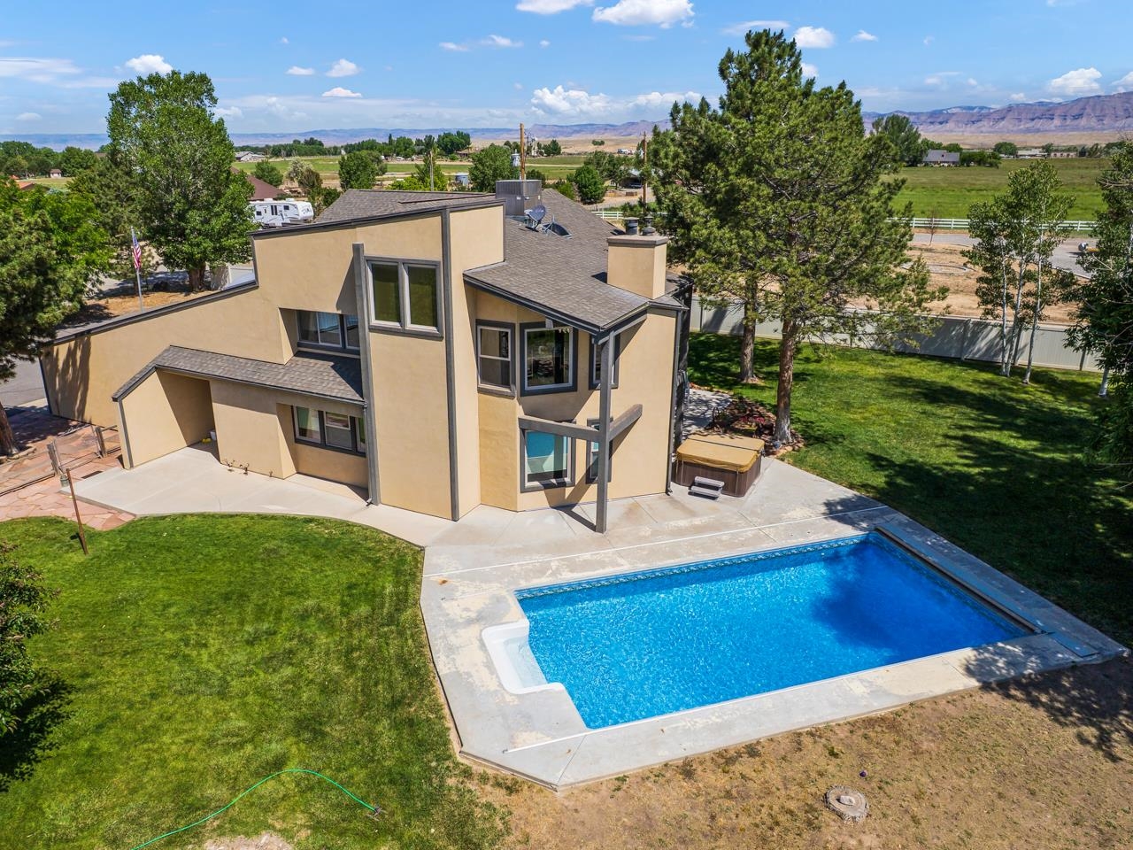 1140-23 23 1/2 Road Grand Junction, CO 81505 - Photo 2 of 42 a view of a house with a yard porch and sitting area