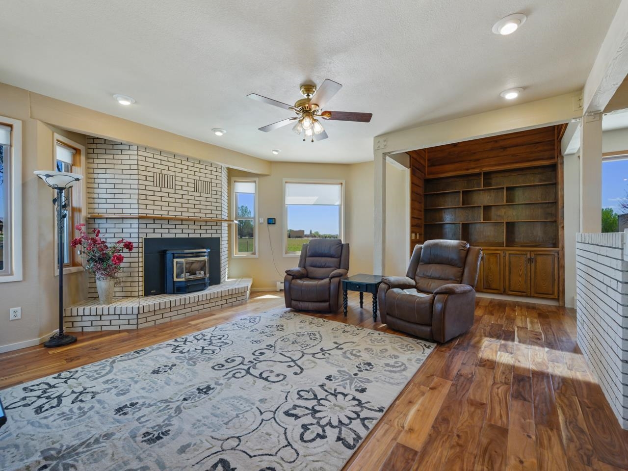 1140-23 23 1/2 Road Grand Junction, CO 81505 - Photo 22 of 42 a living room with furniture and a fireplace
