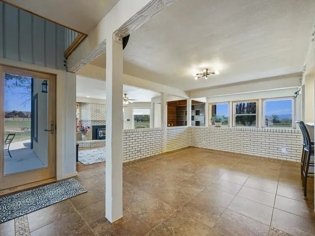 a view of living room filled with furniture