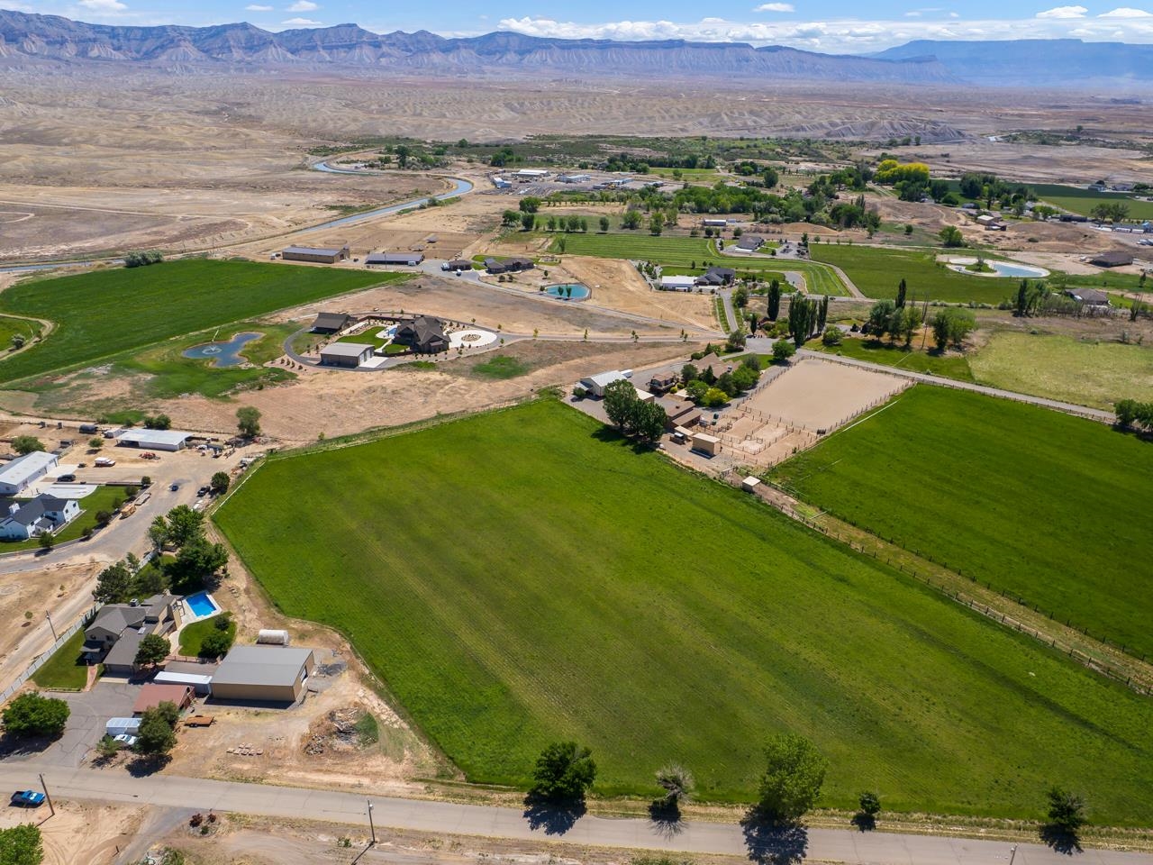 1140-23 23 1/2 Road Grand Junction, CO 81505 - Photo 6 of 42 an aerial view of residential houses with outdoor space