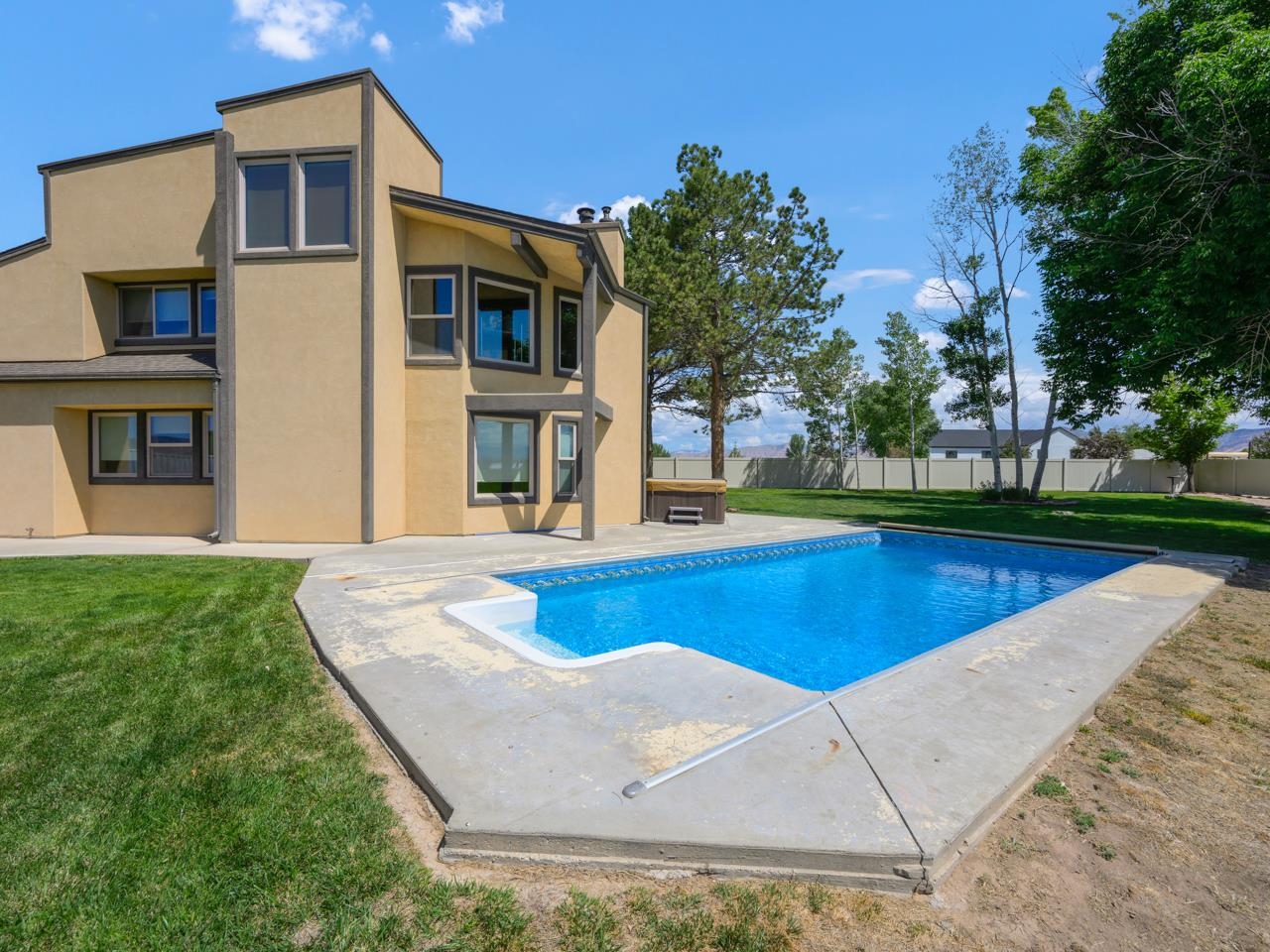 1140-23 23 1/2 Road Grand Junction, CO 81505 - Photo 7 of 42 a view of outdoor space yard swimming pool and porch