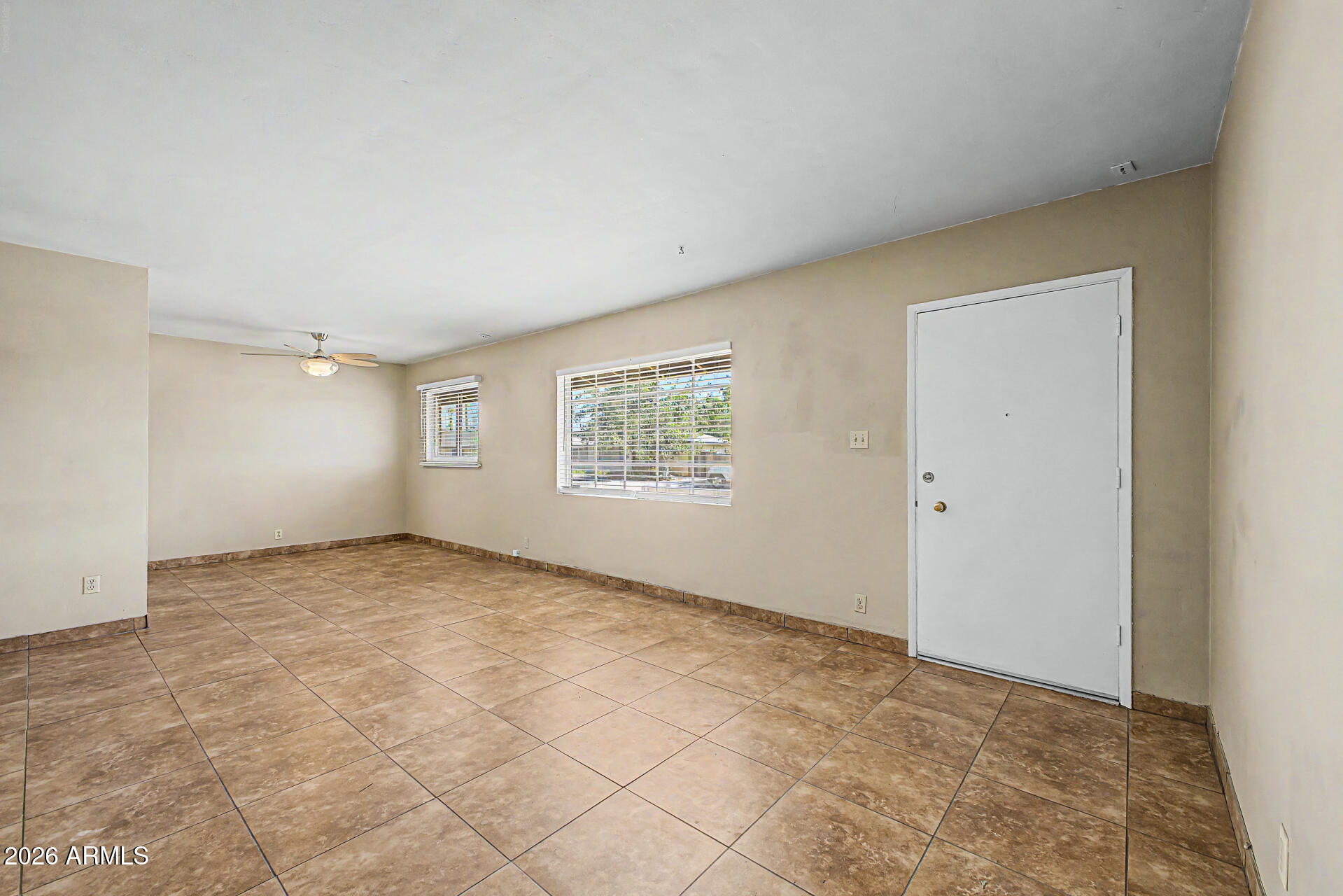 2022 East Monterey Way Phoenix, AZ 85016 - Photo 4 of 29 an empty room with windows
