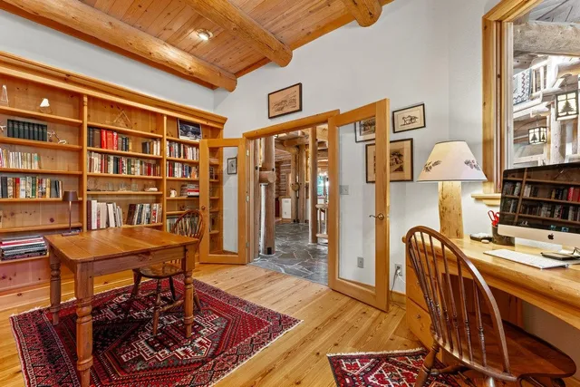 a workspace with furniture and rug