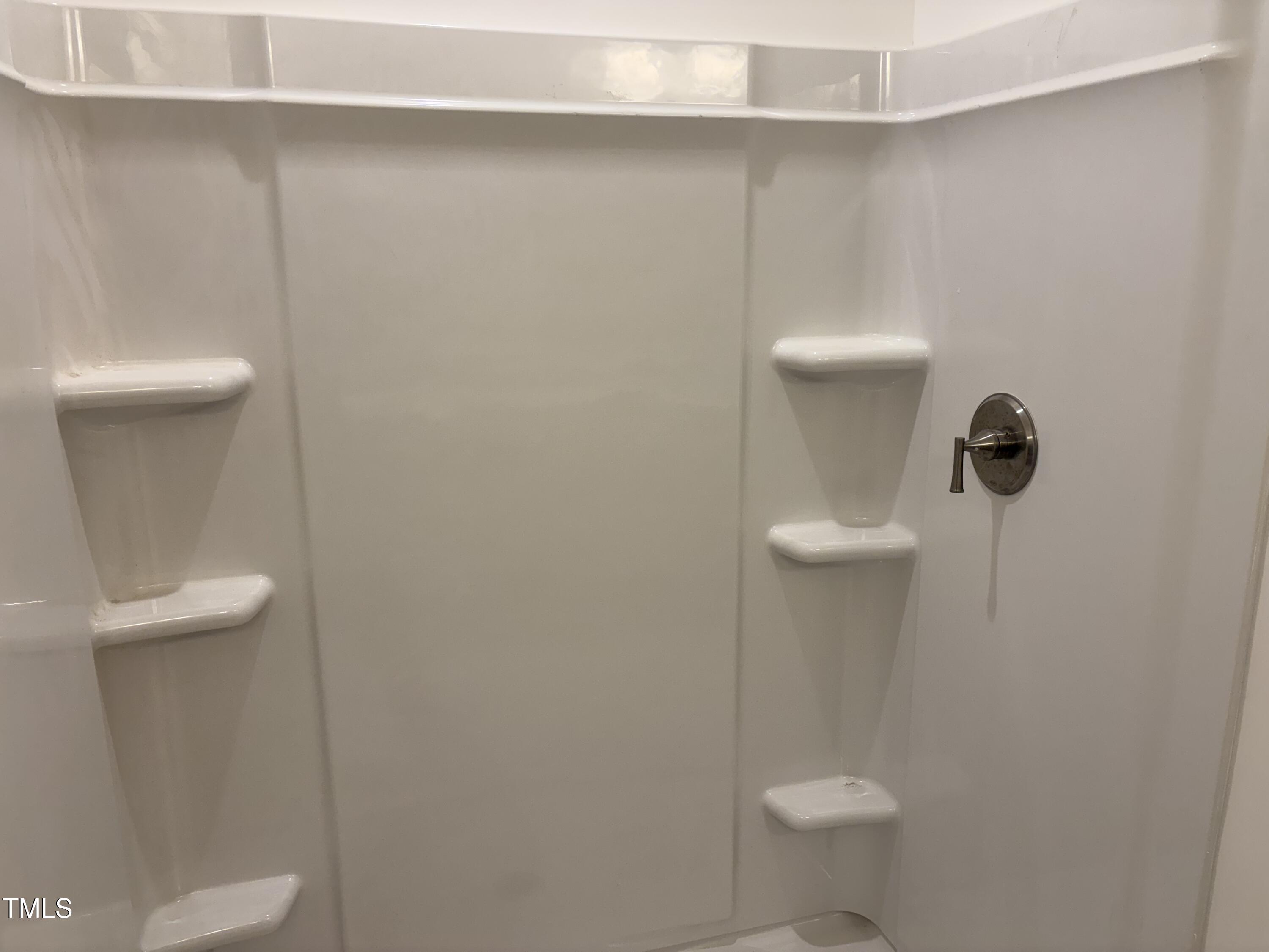 617 Weather Ridge Lane, Unit 32 Cary, NC 27513 - Photo 9 of 18 Primary Bath Walk-in Shower