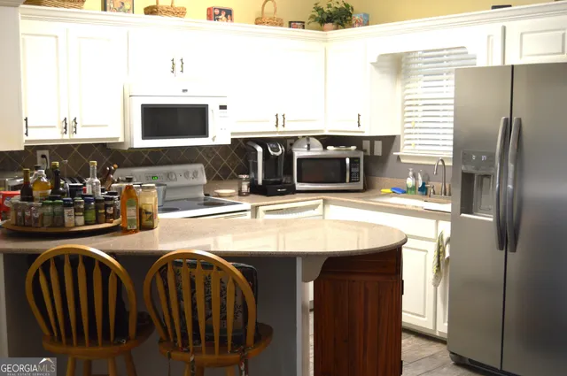 $293,000 | 20 Glen Eagle Court, Unit 102, Clayton, GA 30525