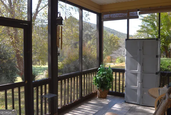 a view of a porch with a yard