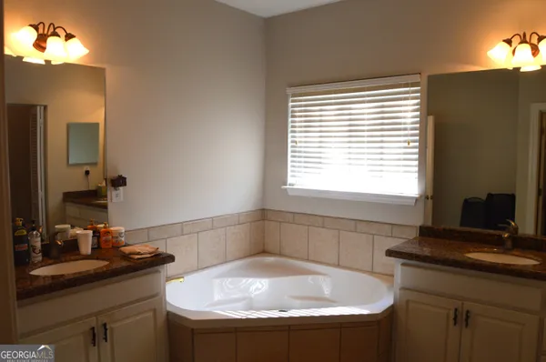a bathroom with a sink and a bathtub