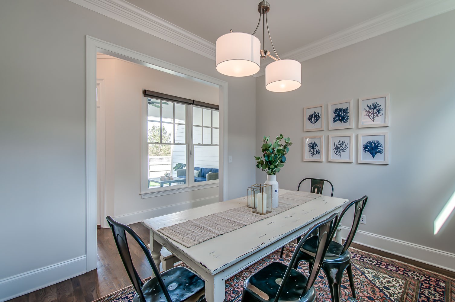 4030 General Martin Lane Franklin, TN 37064 - Photo 16 of 47 a view of a dining room with furniture window and wooden floor