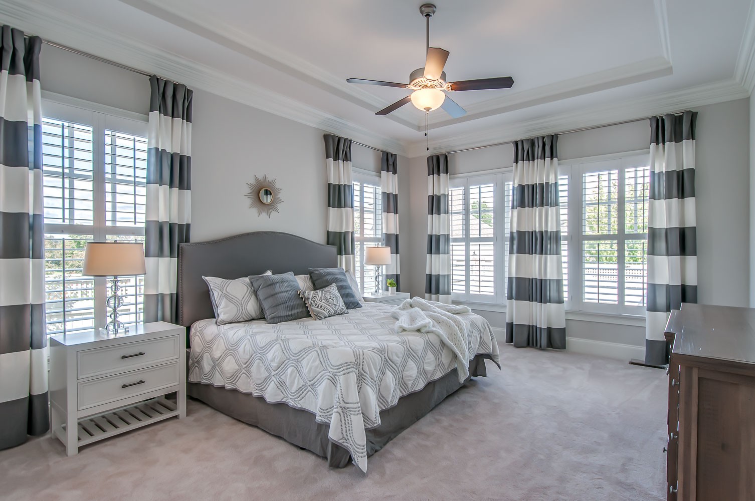 4030 General Martin Lane Franklin, TN 37064 - Photo 17 of 47 a spacious bedroom with a bed a couch and large window