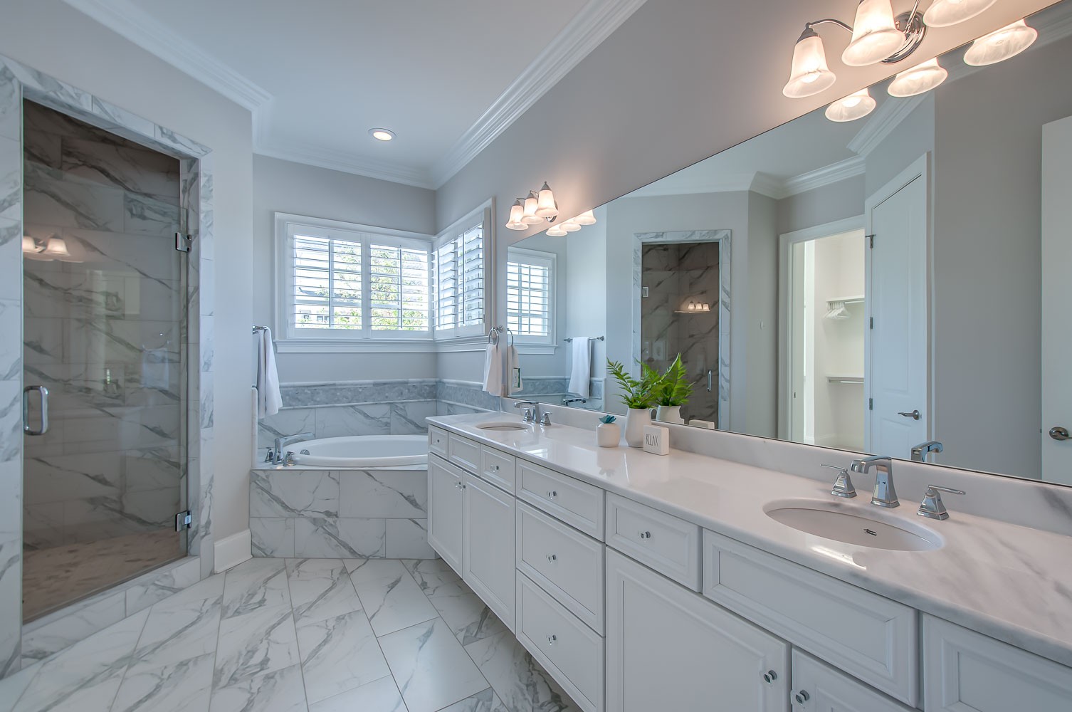 4030 General Martin Lane Franklin, TN 37064 - Photo 20 of 47 a bathroom with a granite countertop sink mirror and a bath tub