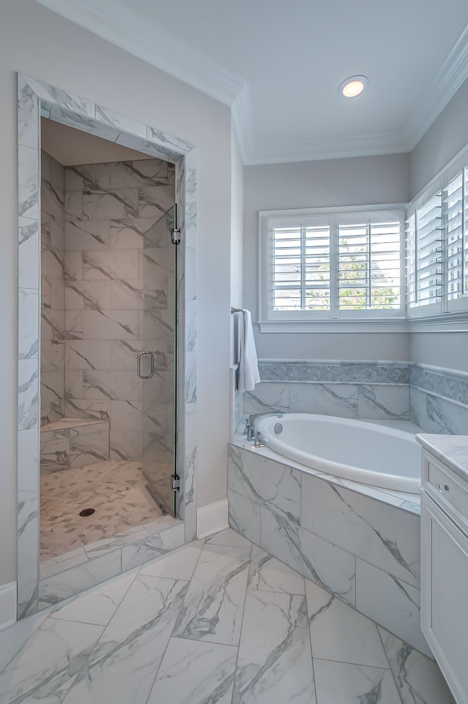 4030 General Martin Lane Franklin, TN 37064 - Photo 22 of 47 a spacious bathroom with a bathtub and shower