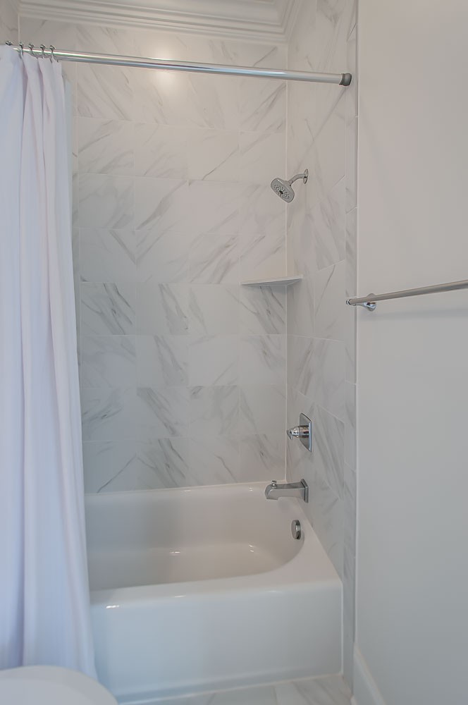 4030 General Martin Lane Franklin, TN 37064 - Photo 27 of 47 a close up of a bathtub in a bathroom