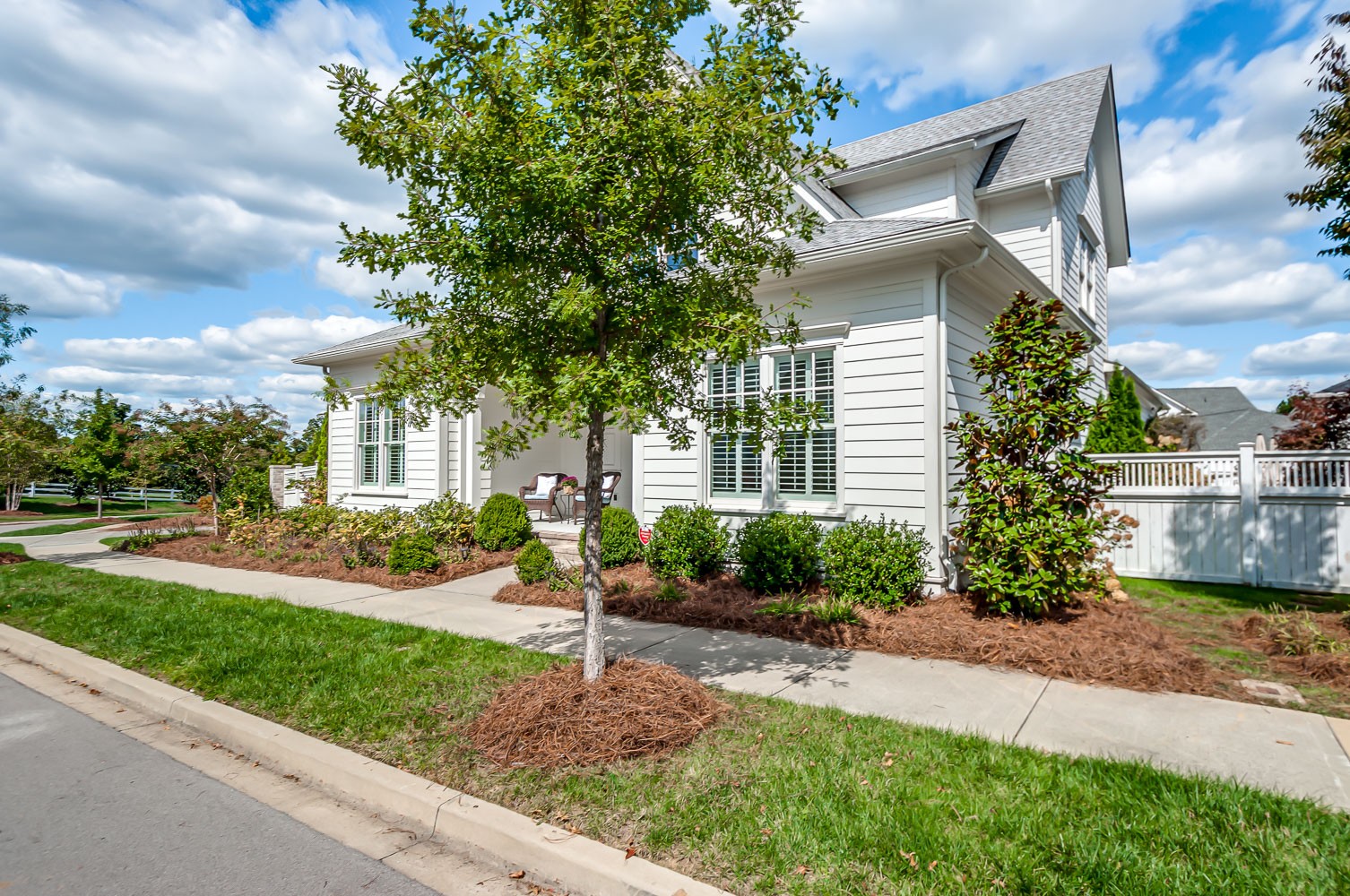 4030 General Martin Lane Franklin, TN 37064 - Photo 3 of 47 a front view of a house with a yard and potted plants