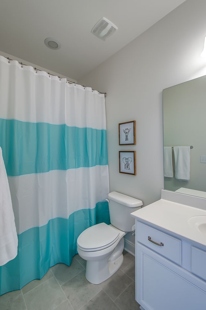 4030 General Martin Lane Franklin, TN 37064 - Photo 31 of 47 a bathroom with a toilet a sink and bathtub