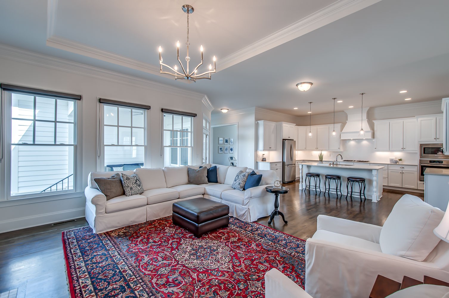 4030 General Martin Lane Franklin, TN 37064 - Photo 5 of 47 a living room with furniture wooden floor and a chandelier