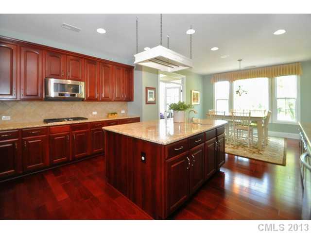 11640 Kyrene Road Charlotte, NC 28277 - Photo 7 of 16 a kitchen with a sink stove and cabinets