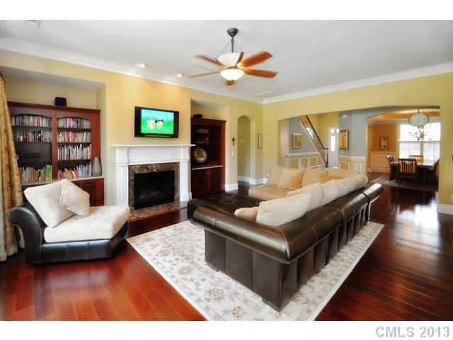 11640 Kyrene Road Charlotte, NC 28277 - Photo 8 of 16 a living room with furniture and a fireplace