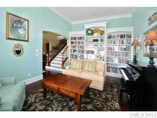 11640 Kyrene Road Charlotte, NC 28277 - Photo 9 of 16 a living room with furniture and a book shelf
