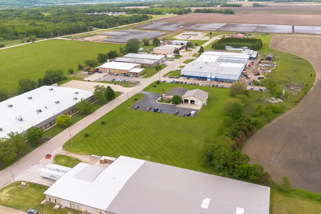 an aerial view of a house with a garden