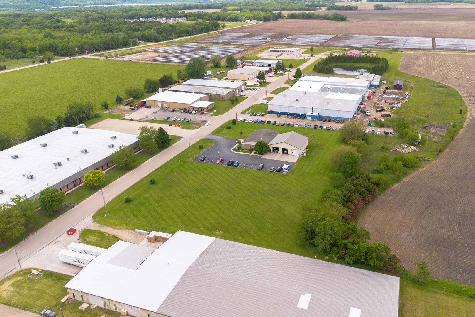 2 Wolfer Industrial Park Spring Valley, IL 61362 - Photo 4 of 8 an aerial view of a house with a garden