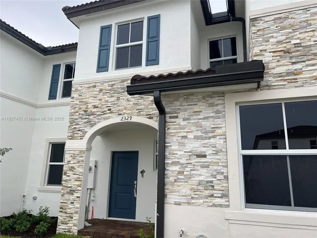 a building with a window and balcony