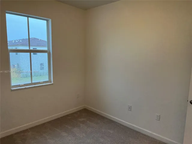 a view of a yard with an outdoor space