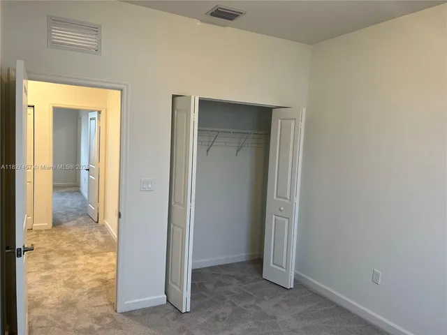 a view of a garden with an ocean