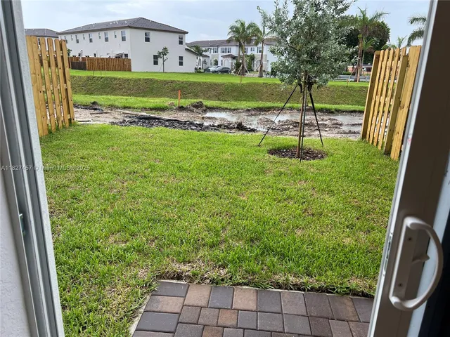 a view of a garden with a slide