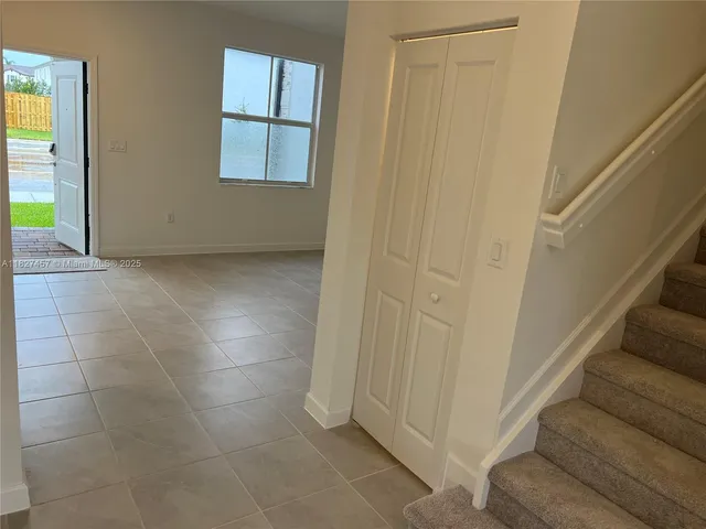 a view of an entryway with staircase