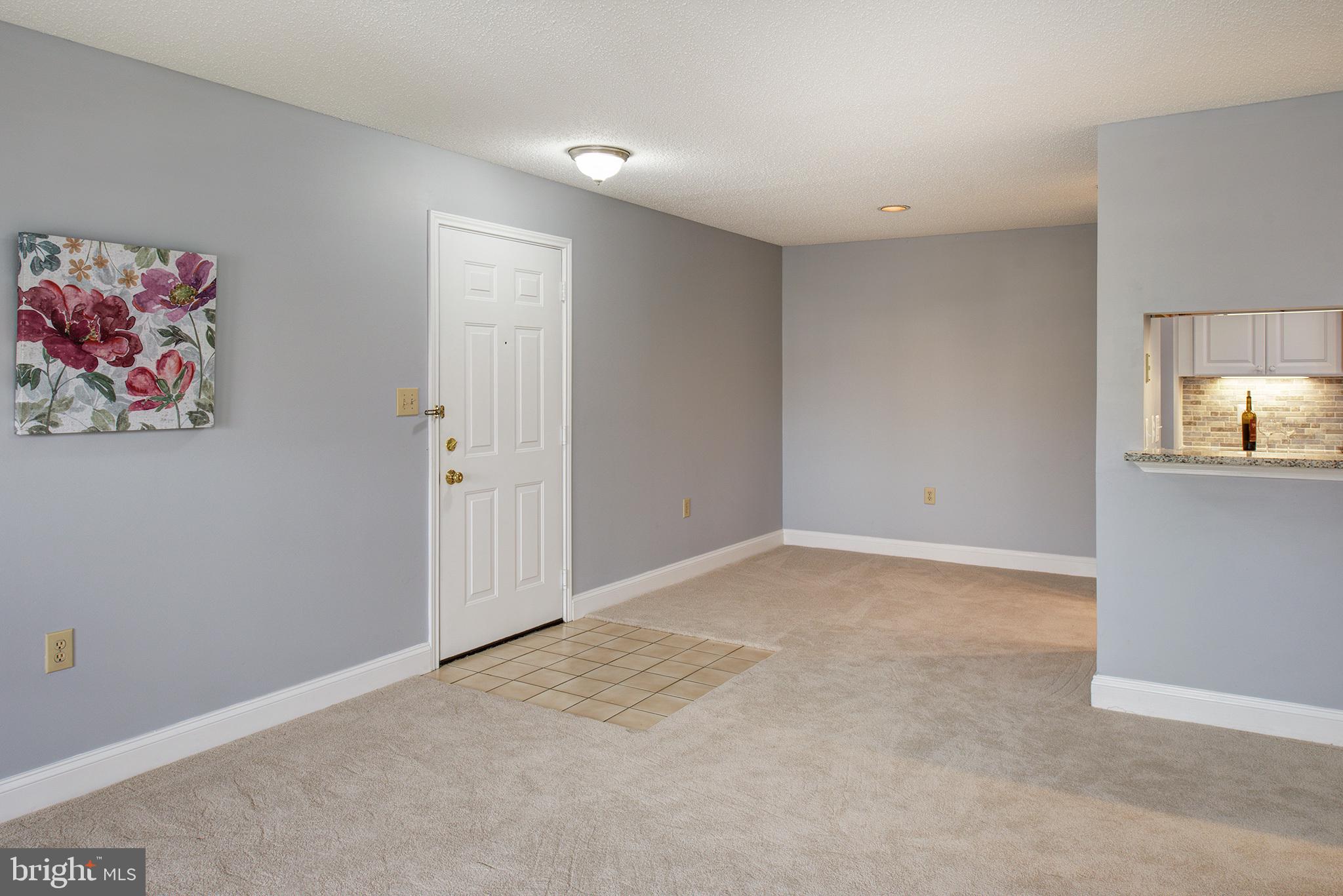 20951 Timber Ridge Terrace, Unit 202 Ashburn, VA 20147 - Photo 15 of 16 Looking to the dining room