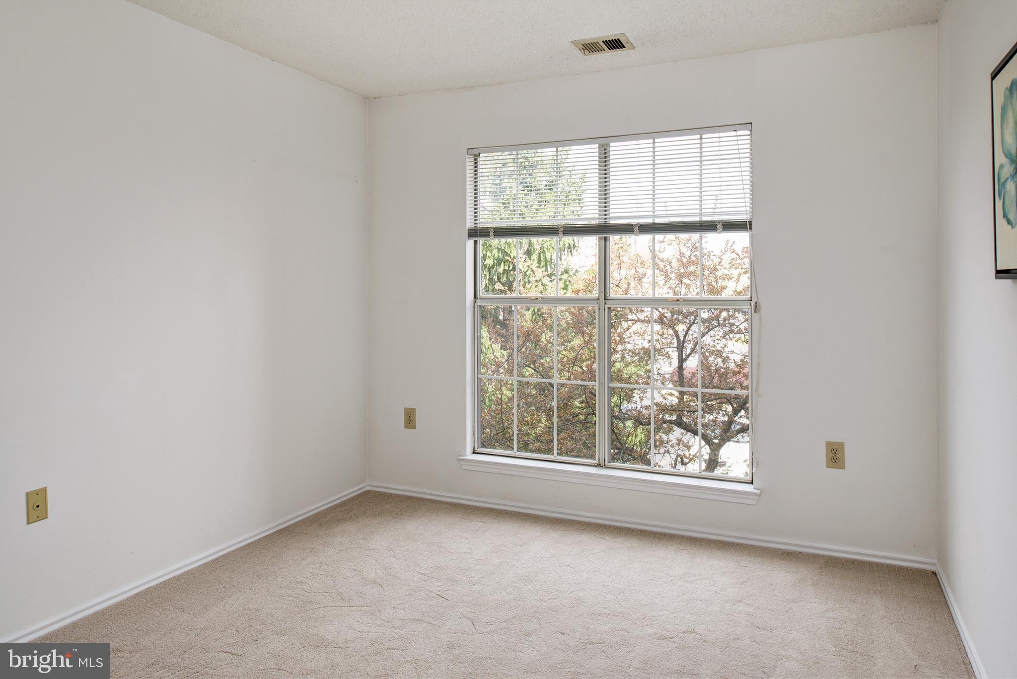 20951 Timber Ridge Terrace, Unit 202 Ashburn, VA 20147 - Photo 10 of 16 Nice size second bedroom