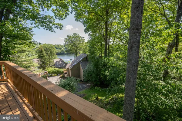 a living room with furniture flat screen tv and a fireplace