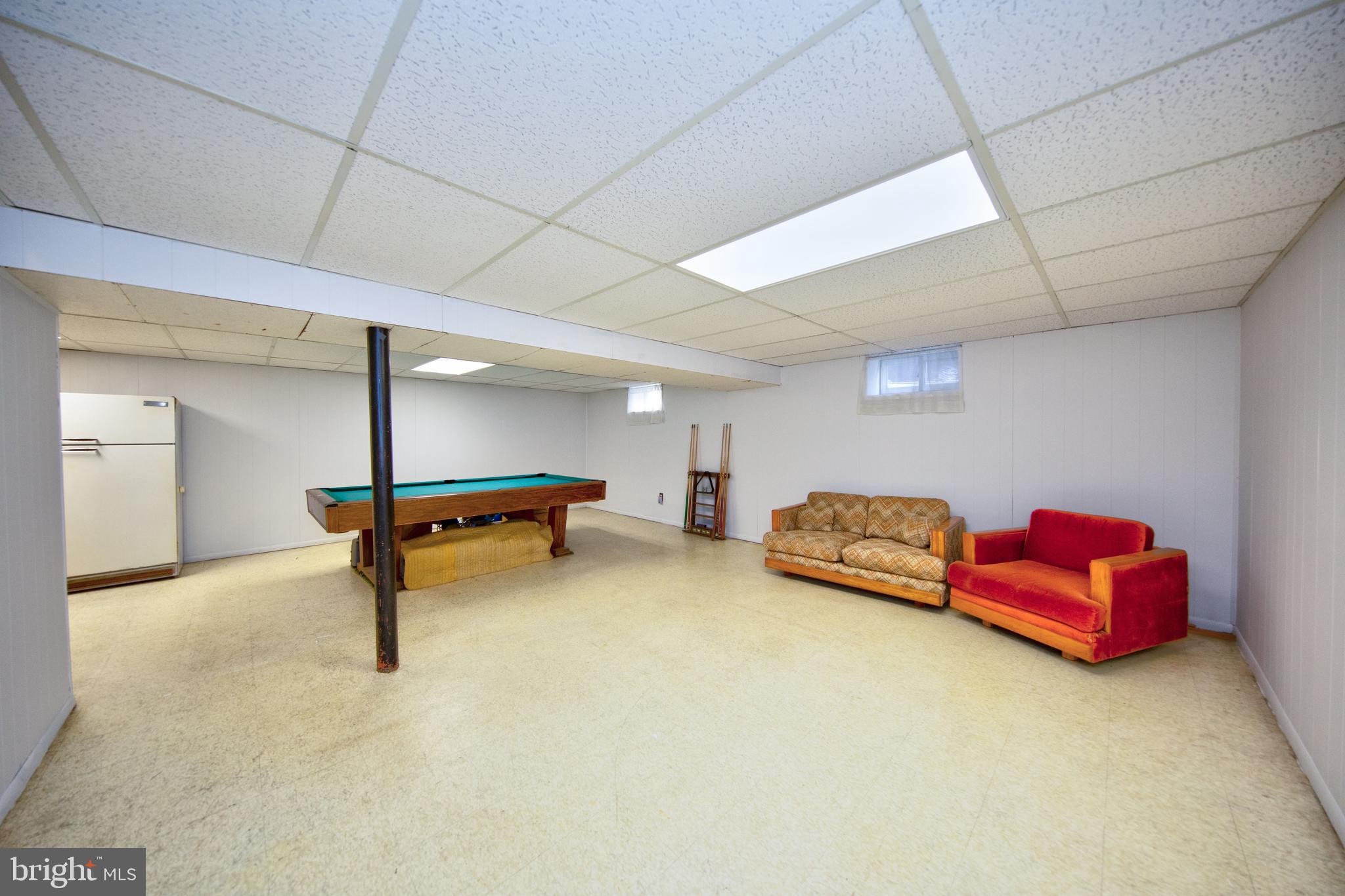 6119 Deerbrook Road Baltimore, MD 21228 - Photo 22 of 28 Large rec room in lower level