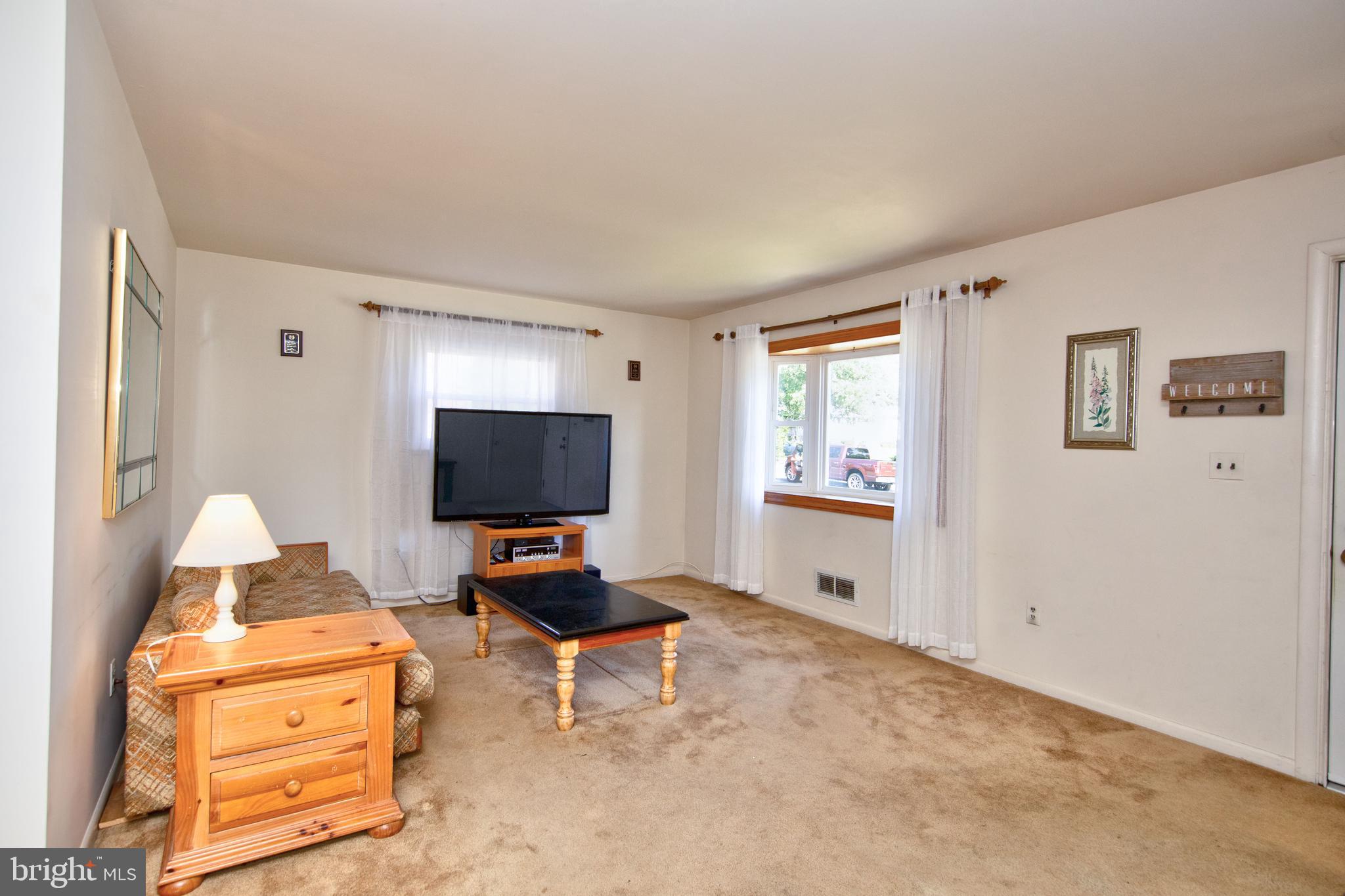 6119 Deerbrook Road Baltimore, MD 21228 - Photo 5 of 28 Living room with bay window