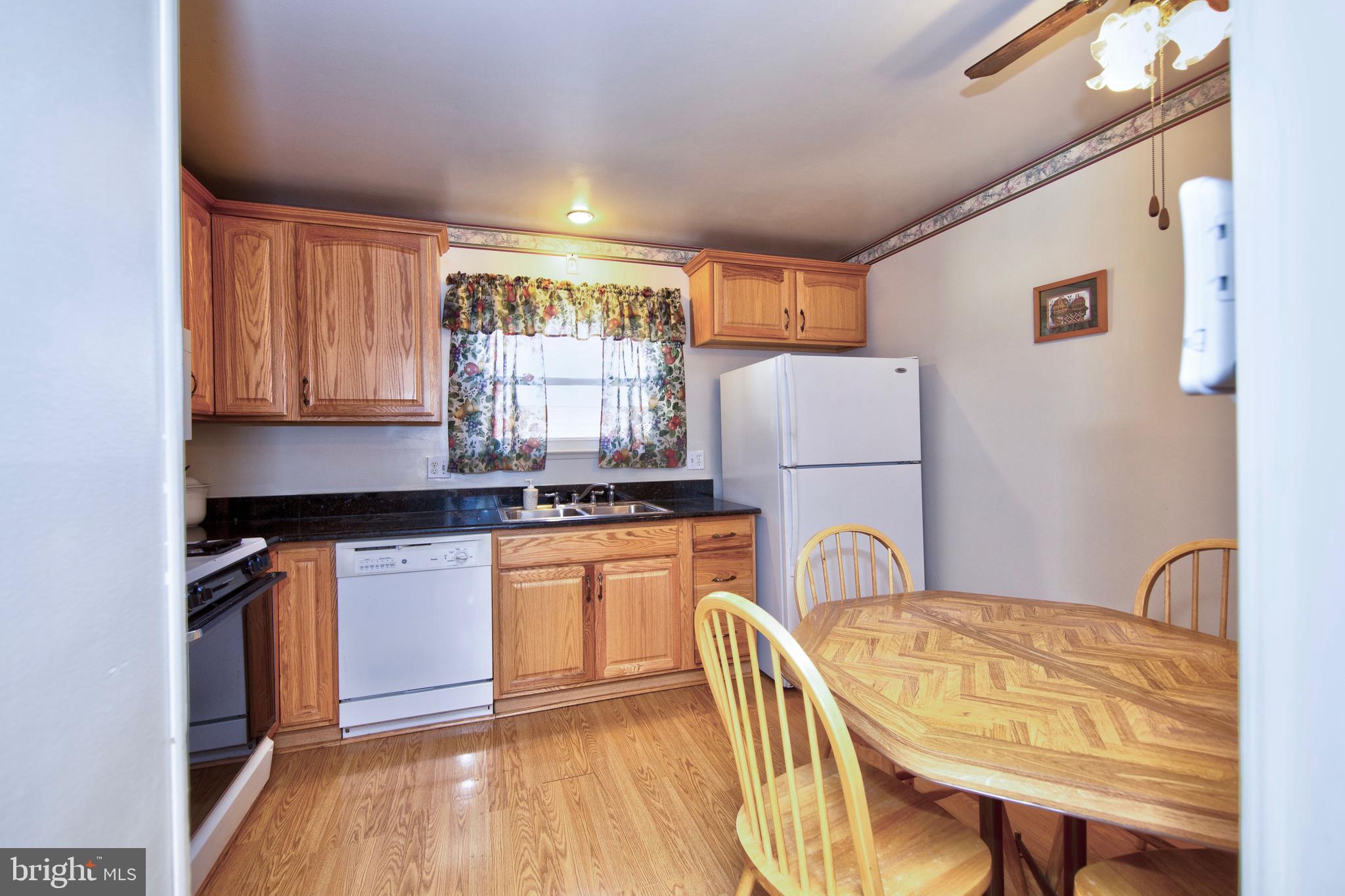 6119 Deerbrook Road Baltimore, MD 21228 - Photo 9 of 28 Kitchen with granite counters
