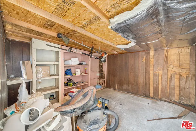 an aerial view of a house with a garden