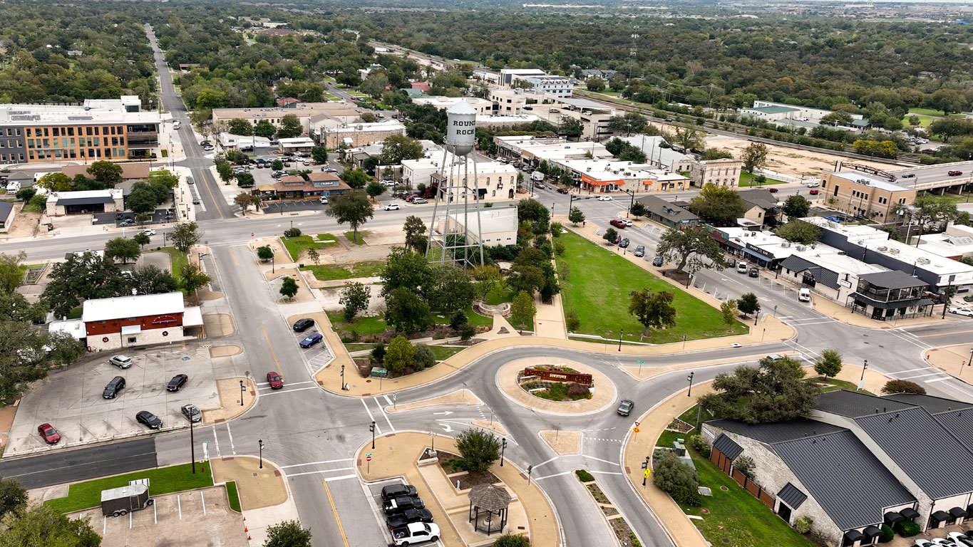 2605 Sam Bass Road, Unit 107 Round Rock, TX 78681 - Photo 6 of 11 an aerial view of residential house with outdoor space