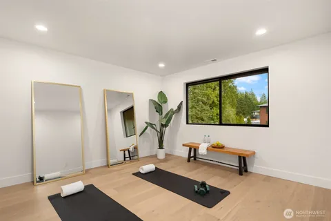 a view of a house with a yard and garage